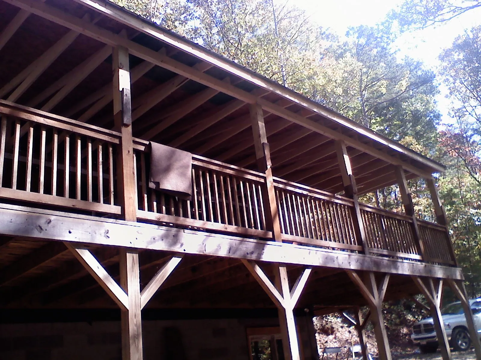Timber framing under a new elevated porch and deck — Roof Leak Repair in Burr Oak by Roofing Brothers